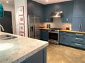 Well-equipped kitchen with stainless steel appliances, stylish cabinets, and countertops, showcasing functionality at 845 Spring Nw St # 129, Atlanta, GA 30308