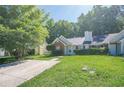Charming single story home with brick and vinyl siding and a manicured lawn at 1249 Scripps Sw Ct, Marietta, GA 30008