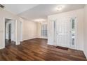 Inviting foyer with beautiful wood floors, and ample natural light at 257 Se Ashland Park Se Ct, Lawrenceville, GA 30045