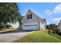 Attached two-car garage showcasing ample parking and convenient access at 257 Se Ashland Park Se Ct, Lawrenceville, GA 30045