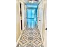 Hallway featuring decorative floors and doors at 401 Autumn Leaf Way, Norcross, GA 30093