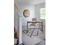 Cozy home office with a stylish desk, comfortable chair, and natural light from the window at 55 Bandimere Pkwy, Dallas, GA 30157
