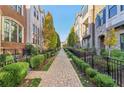 A well-maintained walkway lined with manicured shrubs leading through the neighborhood at 621 Broadview Ne Ter, Atlanta, GA 30324