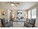 Bright living room showcasing contemporary decor, large windows, and comfortable seating at 4408 Brandon Ne Ct, Marietta, GA 30066