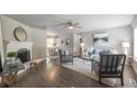 Inviting living room features a fireplace, stylish furnishings, and wood-look flooring at 4408 Brandon Ne Ct, Marietta, GA 30066