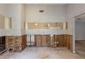 A bare kitchen with studs and exposed pipes, ready for renovation and customization at 5856 Rock Rd, Union City, GA 30291