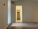 Hallway with hardwood floors at 225 Magnolia Tree Ct, Johns Creek, GA 30022