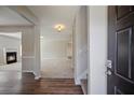 Inviting entryway features hardwood floors, fresh paint, and staircase to the upper level at 3223 Tallon Sw Ln, Atlanta, GA 30311