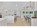 Spacious open kitchen with modern appliances, large island, and hardwood flooring at 4376 Riverwood Cir, Decatur, GA 30035