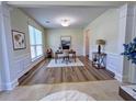 Bright office with wood floors, white trim and lots of natural light from the large windows at 2130 Chattahoochee Dr, Duluth, GA 30097
