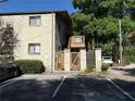 Charming building featuring a deck and beautiful landscaping, complete with a parking area at 375 6Th Ne St # 5, Atlanta, GA 30308