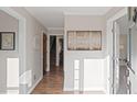 Welcoming foyer featuring hardwood floors, neutral paint, and staircase at 1495 Oak Springs Dr, Marietta, GA 30066
