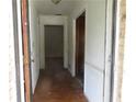 Entryway hallway with doors leads into home at 2447 Omaha Sw Rd, Atlanta, GA 30331