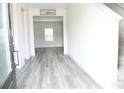 Bright foyer with hardwood floors and staircase at 3855 Saddle Bag Ct, Dacula, GA 30019