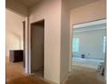 Bright hallway showcasing open layout to kitchen and other rooms at 610 Presley Farm Pkwy, Rockmart, GA 30153