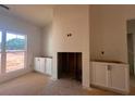 Bright living room featuring a fireplace and built-in cabinets at 610 Presley Farm Pkwy, Rockmart, GA 30153