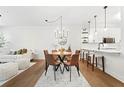 Bright dining area adjacent to the kitchen, perfect for entertaining guests at 273 12Th Ne St # 114, Atlanta, GA 30309
