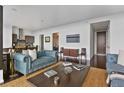 Open-concept living room showcases modern design and connects seamlessly with the kitchen area at 45 Ivan Allen Jr Blvd # 2203, Atlanta, GA 30308