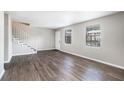 Bright, airy living room with new laminate flooring, fresh paint and lots of natural light at 6354 Shannon Pkwy # 30C, Union City, GA 30291