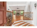 Bright living room featuring a stone fireplace and wood floors at 3007 Manning Dr, Marietta, GA 30062