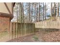 A fenced yard provides privacy and defines the property line at 3252 Abbeywood Dr, Decatur, GA 30034