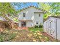 The backyard featuring a shed, patio and grassy area perfect for outdoor activities and relaxation at 912 Third St, Stone Mountain, GA 30083