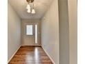 Inviting entryway features wood look floors and neutral paint at 1965 Sterling Creek Ct, Snellville, GA 30078
