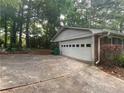 Attached garage with ample driveway space at 3794 W Hayward Ct, Tucker, GA 30084
