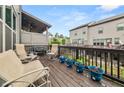Relaxing outdoor deck with comfortable seating, perfect for enjoying the fresh air and neighborhood views at 3 Hundley Ln, Roswell, GA 30076