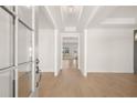 Bright foyer with hardwood floors, white trim, and an inviting open floor plan at 3772 Tielman St, Snellville, GA 30078