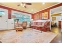 Cozy living room with hardwood floors, colorful walls, and ample natural light, creating an inviting space at 3839 Brookcrest Cir, Decatur, GA 30032