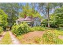 Charming home featuring a welcoming front porch and a neatly landscaped front yard at 782 Marion Se Ave, Atlanta, GA 30312