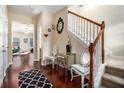 Inviting entryway with hardwood floors, a staircase, and decorative accents creating a warm and stylish first impression at 2555 Flat Shoals Rd # 1405, College Park, GA 30349