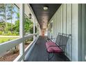 Spacious front porch with room for seating and enjoying the neighborhood views at 3392 Inns Brook Way, Snellville, GA 30039