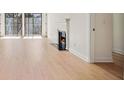 Bright living room with hardwood floors and fireplace at 2921 Lenox Rd # 308, Atlanta, GA 30324