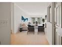 Inviting living room with hardwood floors, fireplace, and ample natural light at 2921 Lenox Rd # 308, Atlanta, GA 30324