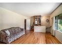 Inviting living room with hardwood floors, a comfortable sofa, and plenty of natural light at 437 Eastland Dr, Decatur, GA 30030