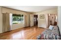 Inviting living room with hardwood floors, bright windows, and neutral-toned walls at 437 Eastland Dr, Decatur, GA 30030