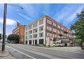 Commercial building featuring painted brick exterior, large windows, and street access at 434 Marietta St Nw # 401, Atlanta, GA 30313