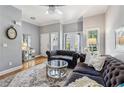 Comfortable living room with beautiful hardwood floors and stylish furniture at 3150 Stonewyck Pl, Decatur, GA 30033