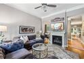 Inviting living room featuring a fireplace, comfortable seating, and stylish decor at 3150 Stonewyck Pl, Decatur, GA 30033