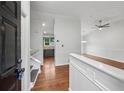 Inviting entryway features hardwood floors, fresh paint, and views to the kitchen and dining area at 1915 North Rd, Snellville, GA 30078