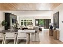 Bright, open concept living space boasts hardwood floors and a seamless transition to outdoor patio at 4132 Carmain Ne Dr, Atlanta, GA 30342