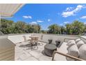 Spacious rooftop deck with stylish outdoor furniture and scenic views, perfect for entertaining at 380 2Nd St, Fayetteville, GA 30214