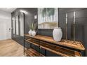 Stylishly decorated hallway featuring modern console table and elegant mirrors at 4954 Jatoba Rd # 72, Acworth, GA 30101