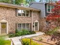 Beautiful brick townhome with a well-manicured front yard and inviting entrance at 2349 Northlake Ne Ct, Atlanta, GA 30345