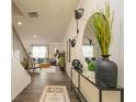 Stylish entryway with hardwood floors, console table, and a view into the living room at 3050 Yellowhammer Dr, Marietta, GA 30064
