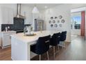 Stylish kitchen featuring a spacious island, modern appliances, and elegant finishes at 989 Bibbs Circle Nw # 25, Atlanta, GA 30318