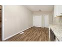 Spacious dining area with hardwood floors, ample natural light, and granite countertops at 2641 Clifton Springs Rd, Decatur, GA 30034
