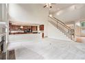 Open-concept living room showcases a fireplace, staircase, and kitchen view at 3505 Belridge Ln, Smyrna, GA 30080